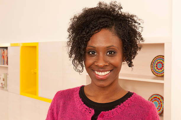 Portrait of an attractive woman of african descent at home